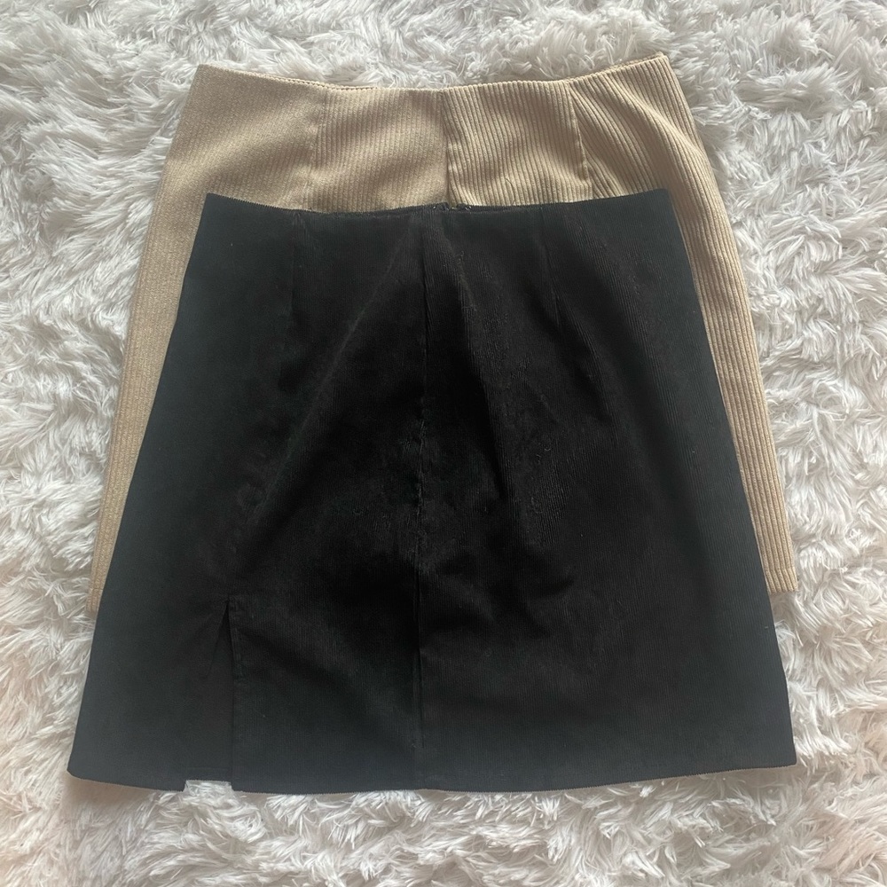 2 corduroy mini skirts with side split